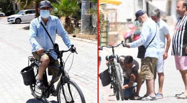 Bisikleti bozulunca yolda kalan Şener Şenin yardımına esnaf koştu